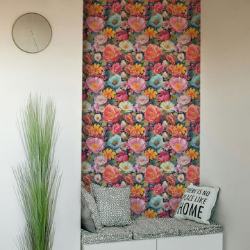 Vibrant Flowers peel and stick wallpaper sheets applied as a colorful floral accent panel above a cozy reading bench with pillows